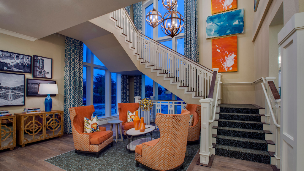 a living room with a staircase and a staircase