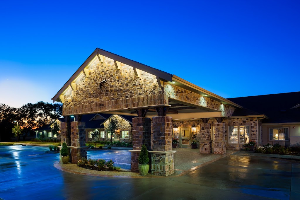 the front entrance to the resort at night