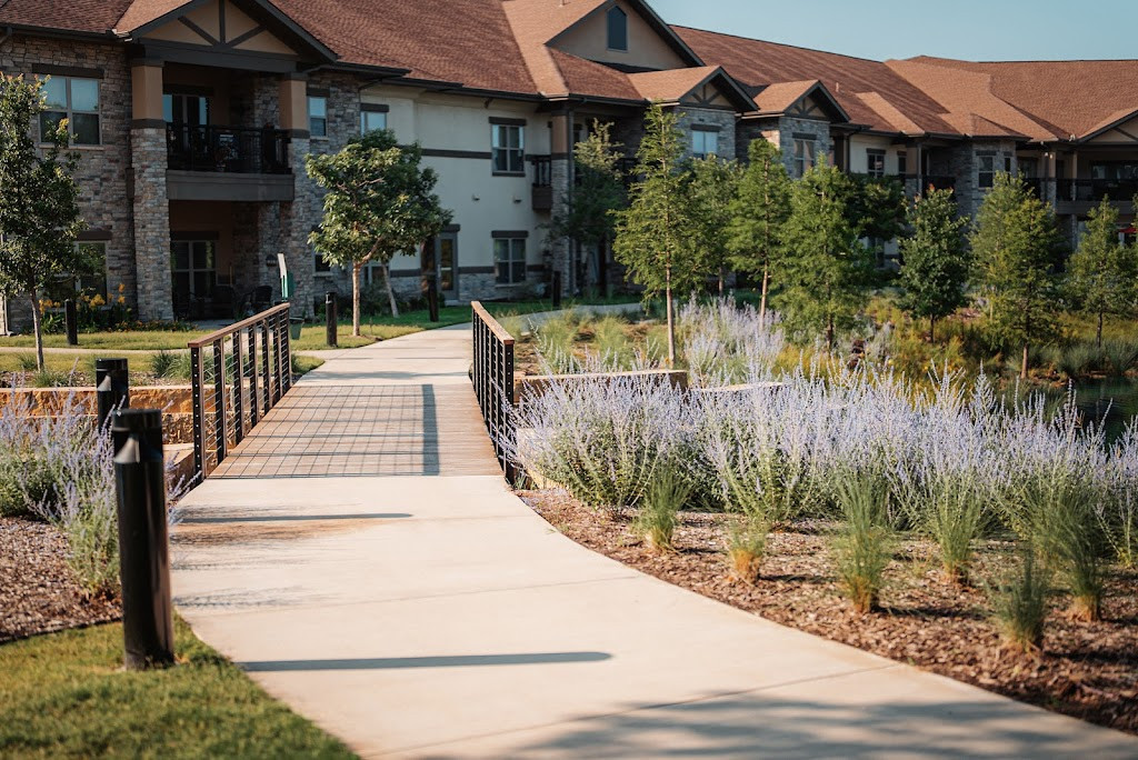 a walkway leading to the apartment buildings