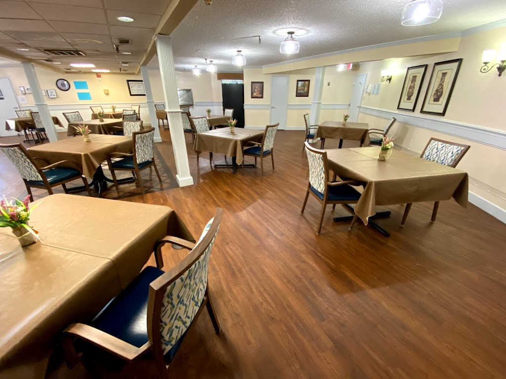 a restaurant with tables and chairs