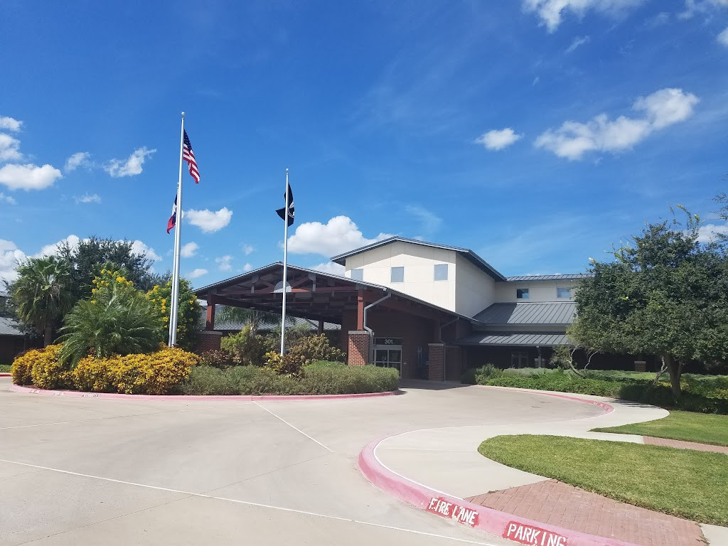 a large building with a flag on the front
