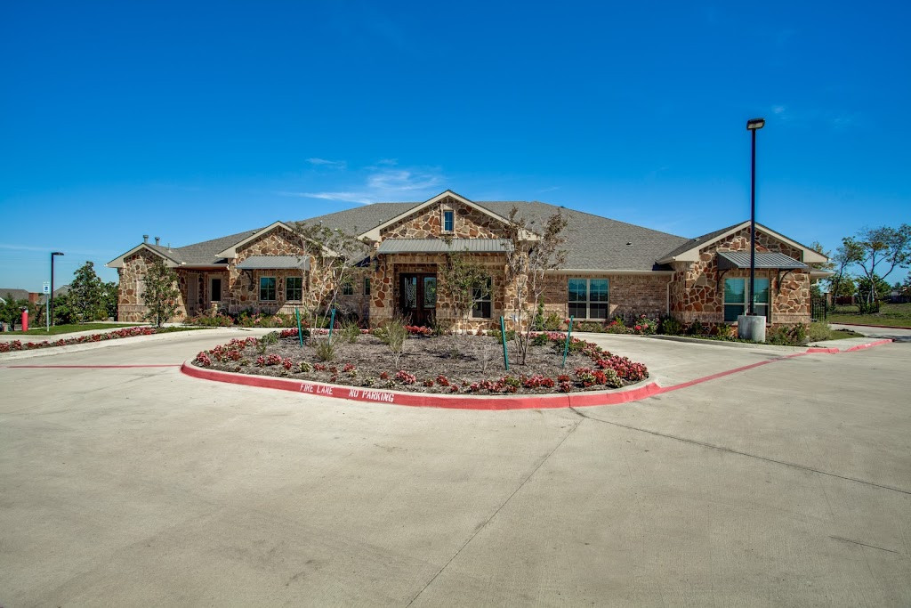 a large house with a lot of landscaping