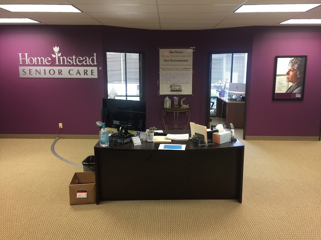 a room with a desk and a sign
