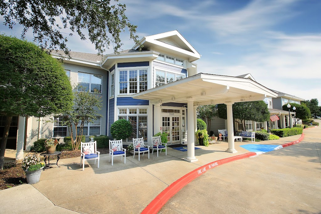 the front entrance to the apartments at the village apartments in sacramento, california