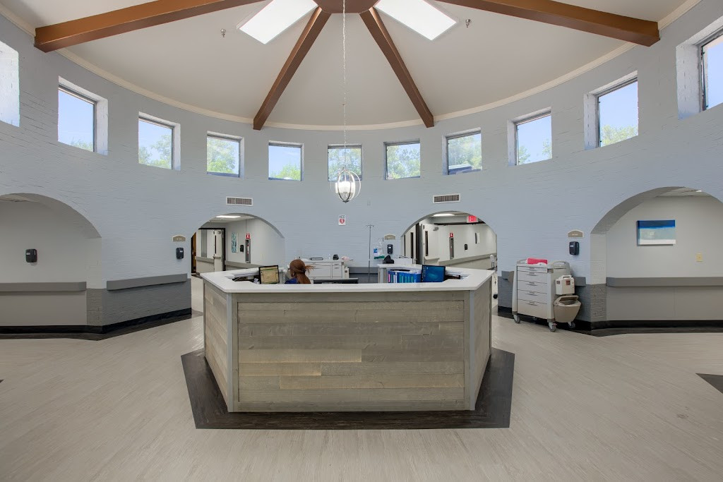 a large room with a large counter and a ceiling