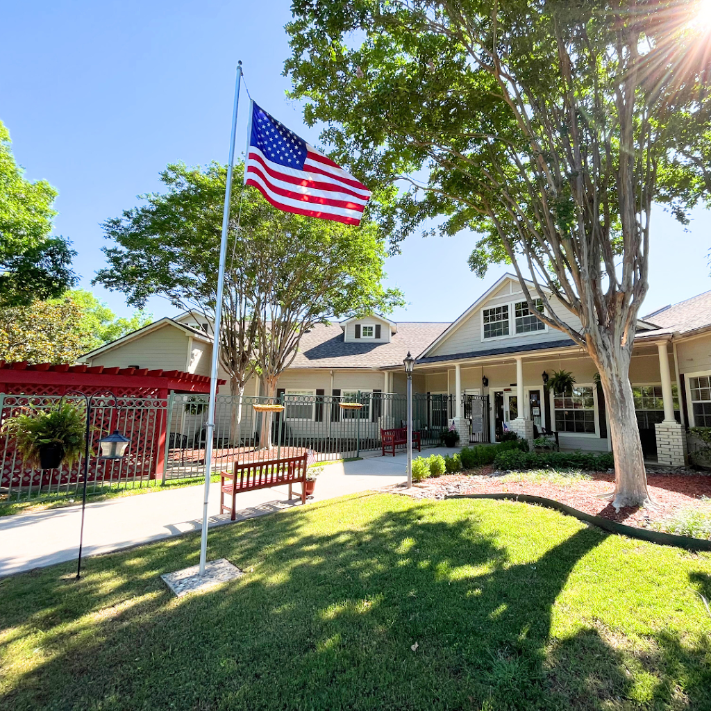 a flag flying in front of a house