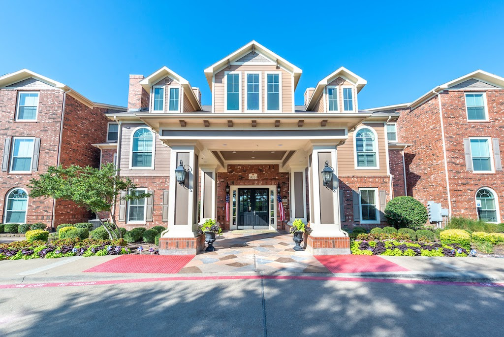 the front entrance to the apartment building at the village at parkview in indianapolis, indiana