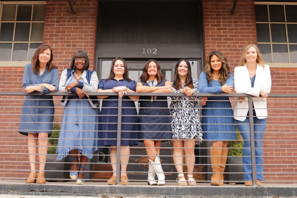 the girls of the school posing for a photo