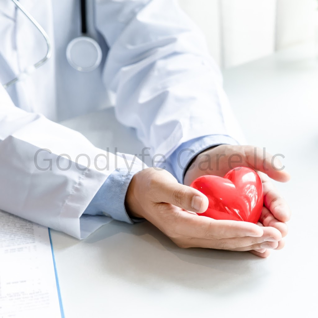 doctor holding a red heart